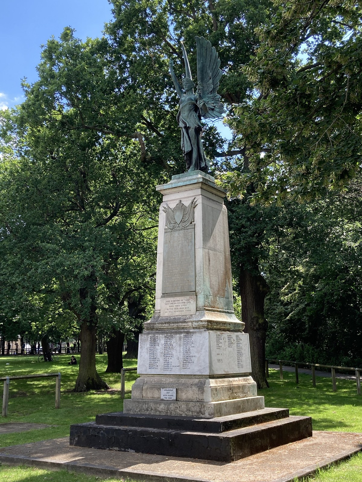 The Grade II listed Wanstead war memorial: a stone column topped with a bronze figure