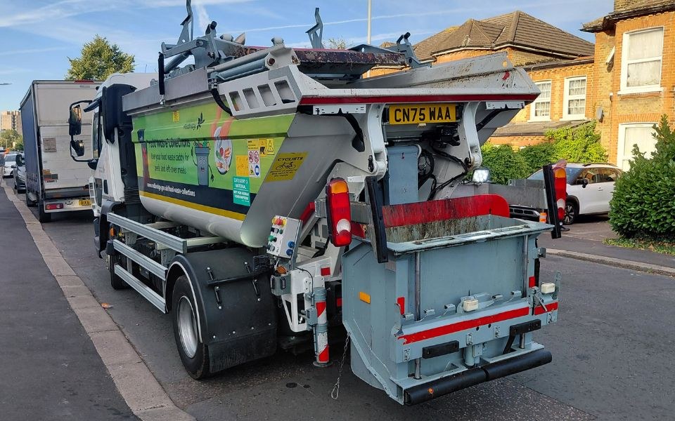 A Redbridge food waste collection lorry parked on a residential street