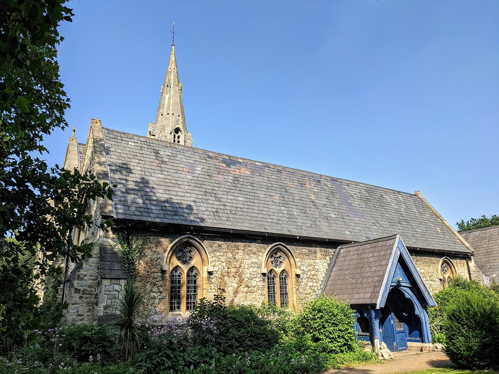 Christ Church, Wanstead, a stone church with a slate roof and a spire