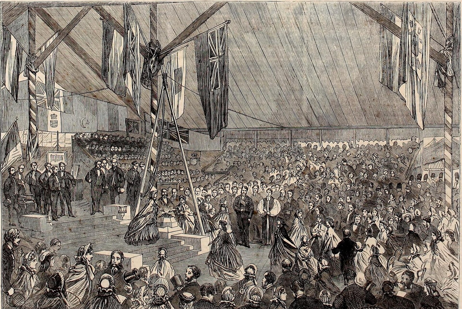 Engraving of a crowd in a flag-hung marquee as the Prince Consort lays the foundation stone